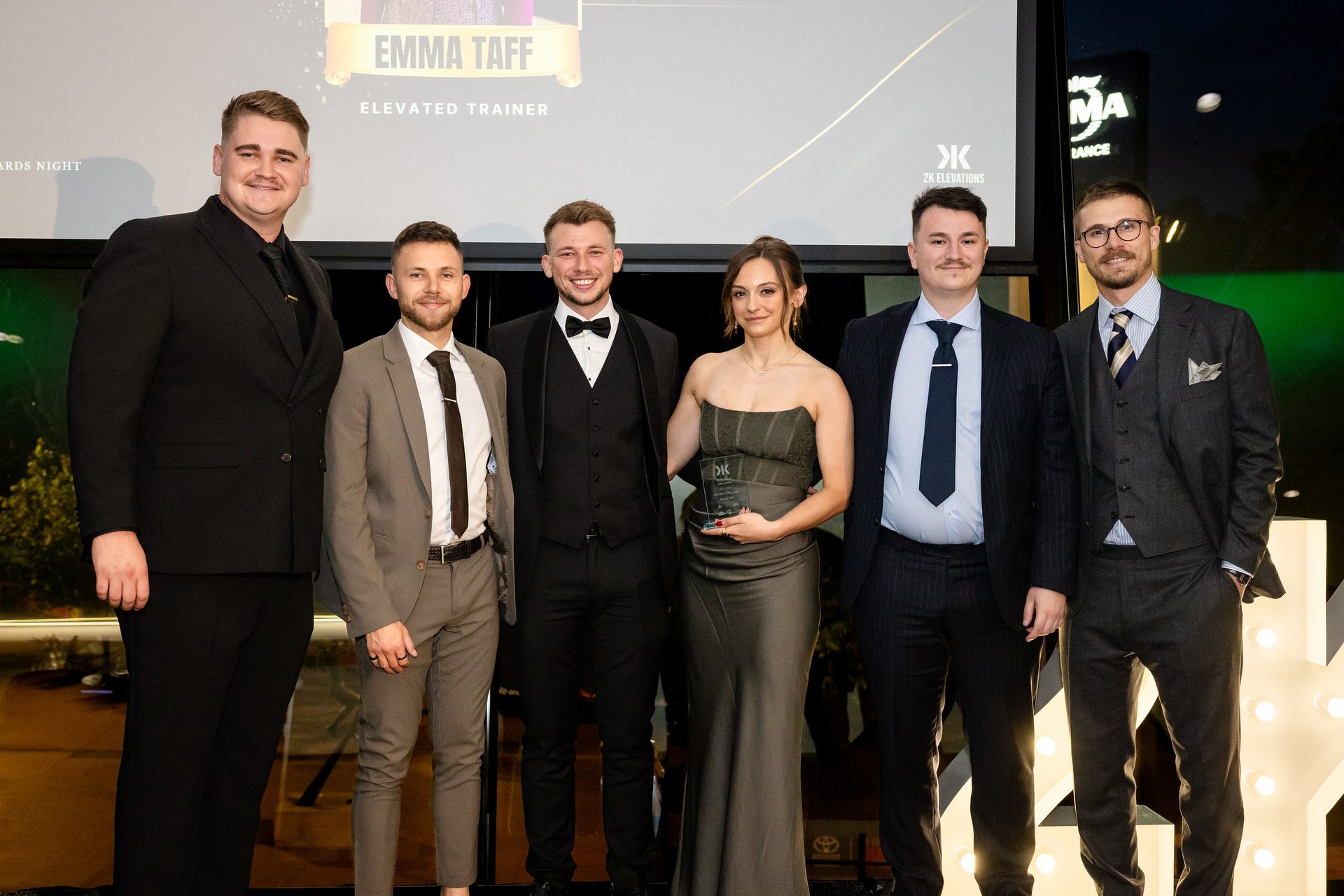 Emma Taff receiving the Elevated Trainer award at the 2K Elevations Annual Awards Night